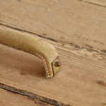 A saddle stitched suede floor lamp by Jacques Adnet (1900 - 1984)
