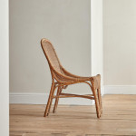 A single wicker side chair in the manner of Louis Sognot (1892 - 1970)