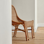 A single wicker side chair in the manner of Louis Sognot (1892 - 1970)