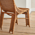 A single wicker side chair in the manner of Louis Sognot (1892 - 1970)