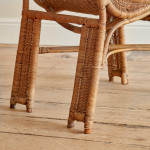 A single wicker side chair in the manner of Louis Sognot (1892 - 1970)