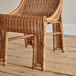 A single wicker side chair in the manner of Louis Sognot (1892 - 1970)