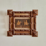 A pair of very fine Empire period prisoner of war straw-work portraits of Napoleon and Marie Louise