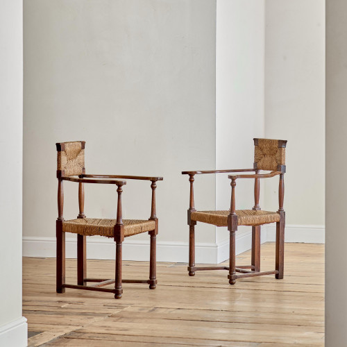 A pair of Arts and Crafts oak carvers by George Walton (1867-1933)