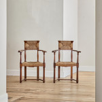 A pair of Arts and Crafts oak carvers by George Walton (1867-1933)