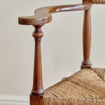 A pair of Arts and Crafts oak carvers by George Walton (1867-1933)