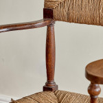 A pair of Arts and Crafts oak carvers by George Walton (1867-1933)