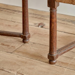 A pair of Arts and Crafts oak carvers by George Walton (1867-1933)