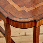 An Art Deco walnut and thuya veneered square occasional table