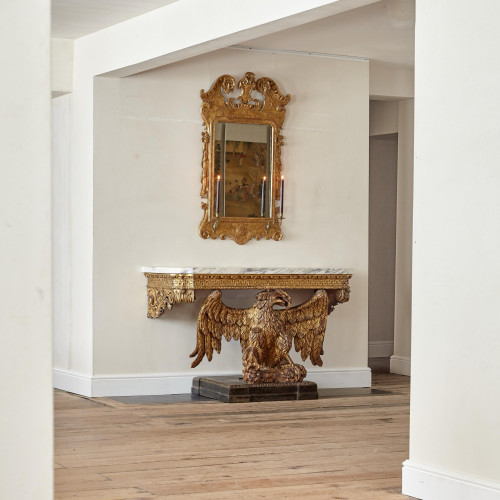An exceptional and rare George II carved and gilt eagle console table in the manner of William Kent (1685 - 1748)