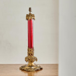 A large ruby glass and gilt brass table lamp