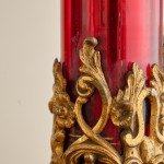 A large ruby glass and gilt brass table lamp