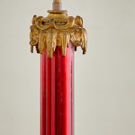 A large ruby glass and gilt brass table lamp