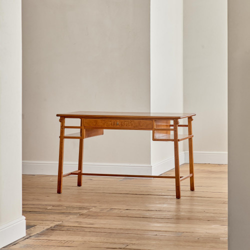 An Art Deco burr elm and fruitwood desk by Maurice Alet (1874 -1967)