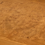 An Art Deco burr elm and fruitwood desk by Maurice Alet (1874 -1967)