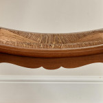A pair of Arts & Crafts oak and rush elbow chairs