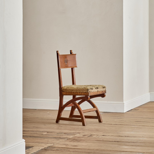 An oak Reformed Gothic side chair attributed to Edward Welby Pugin (1834-1875)