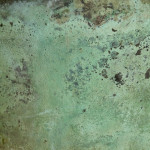 A large riveted verdigris copper