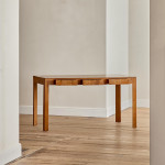 A rectangular walnut writing table