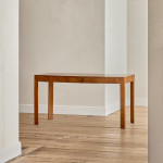 A rectangular walnut writing table