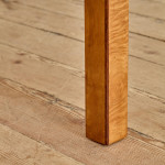 A rectangular walnut writing table
