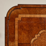 An Art Deco walnut and thuya veneered square occasional table