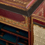 A fine, small early Victorian tooled and gilt leather correspondence table cabinet