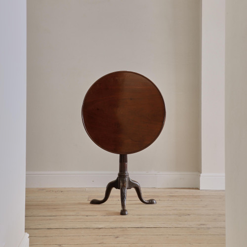 A George II mahogany tilt top tripod table