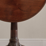 A George II mahogany tilt top tripod table