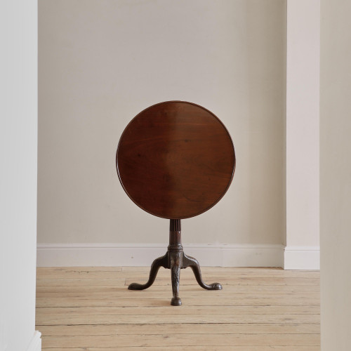 A George II mahogany tilt top tripod table