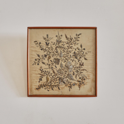 A finely embroidered silk panel
