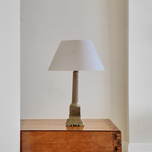 A gilt metal column lamp