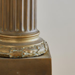 A gilt metal column lamp