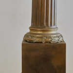 A gilt metal column lamp