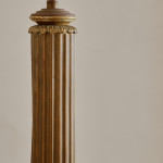 A gilt metal column lamp