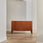 A rosewood veneered and stained walnut 'grissinato' desk by Paolo Buffa (1903 - 1970) and made by Mario Quarti (1901 - 1974)
