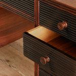 A rosewood veneered and stained walnut 'grissinato' desk by Paolo Buffa (1903 - 1970) and made by Mario Quarti (1901 - 1974)