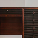 A rosewood veneered and stained walnut 'grissinato' desk by Paolo Buffa (1903 - 1970) and made by Mario Quarti (1901 - 1974)