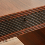 A rosewood veneered and stained walnut 'grissinato' desk by Paolo Buffa (1903 - 1970) and made by Mario Quarti (1901 - 1974)