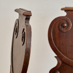 A pair of George IV oak hall chairs