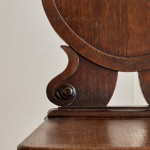 A pair of George IV oak hall chairs