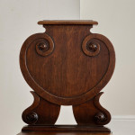 A pair of George IV oak hall chairs