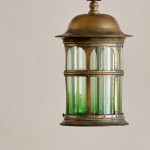 An Arts & Crafts gilt brass hall lantern