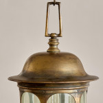 An Arts & Crafts gilt brass hall lantern