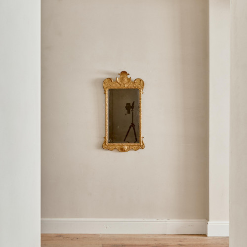 A George II giltwood carved gesso mirror