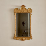 A George II giltwood carved gesso mirror