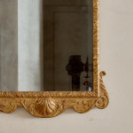 A George II giltwood carved gesso mirror