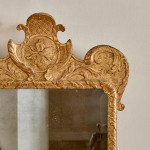 A George II giltwood carved gesso mirror
