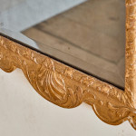 A George II giltwood carved gesso mirror