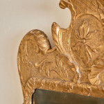 A George II giltwood carved gesso mirror